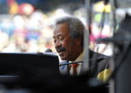 Allen Toussaint performs at the New Orleans Jazz and Heritage Festival in New Orleans, Saturday, May 5, 2012. (AP Photo/Gerald Herbert)