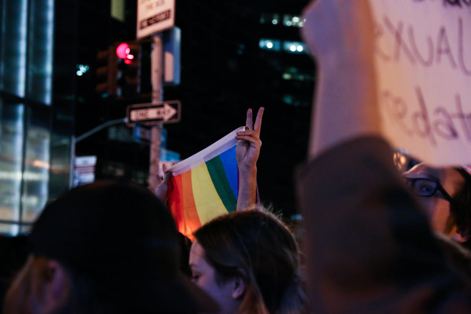 A person holds up a peace sign during protests in New York City