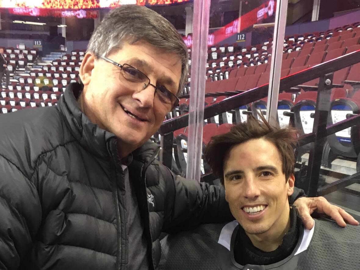 Blair Joseph, who died over the weekend, is seen in this 2018 file photo with Marc-Andre Fleury, a goalie with the Cape Breton Screaming Eagles while Joseph was assistant coach. (Submitted by Blair Joseph - image credit)