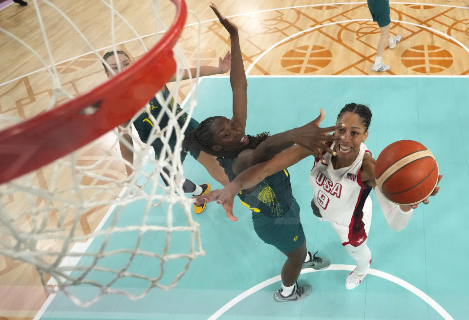 PARIS, FRANCE - AUGUST 09: (EDITORS NOTE: Image was captured using a remote camera positioned above the field of play) A'Ja Wilson #9 of Team United States shoots over Ezi Magbegor #13 of Team Australia during a Women's semifinal match between Team United States and Team Australia on day fourteen of the Olympic Games Paris 2024 at Bercy Arena on August 09, 2024 in Paris, France. (Photo by Pool/Getty Images)