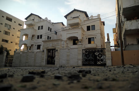 Parts of debris strewn from a building destroyed by Israeli air strikes, are seen in front of a house in Gaza City May 5, 2019. REUTERS/Suhaib Salem