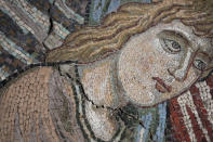 A detail of the mosaics that adorn the dome of one of the oldest churches in Florence, St. John's Baptistery, in Florence, central Italy, Tuesday, Feb. 7, 2023. The Baptistery's dome is undergoing a restoration work that will be done from an innovative scaffolding shaped like a giant mushroom that will stand for the next six years in the center of the church, and that will be open to visitors allowing them for the first and perhaps only time, to come come face to face with more than 1,000 square meters of precious mosaics covering the dome. (AP Photo/Andrew Medichini)