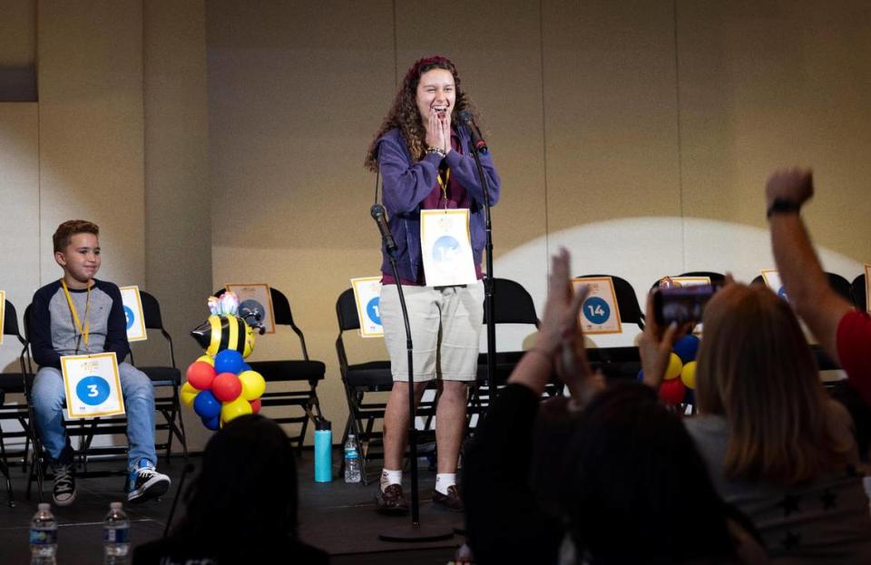 Camila Sanchez-Izquierdo, from Highpoint Academy, wins the Miami Herald Miami-Dade/Monroe County Spelling Bee. Orlando Bodes from Archimedean Academy, left, gets runner up. Alie Skowronski/askowronski@miamiherald.com