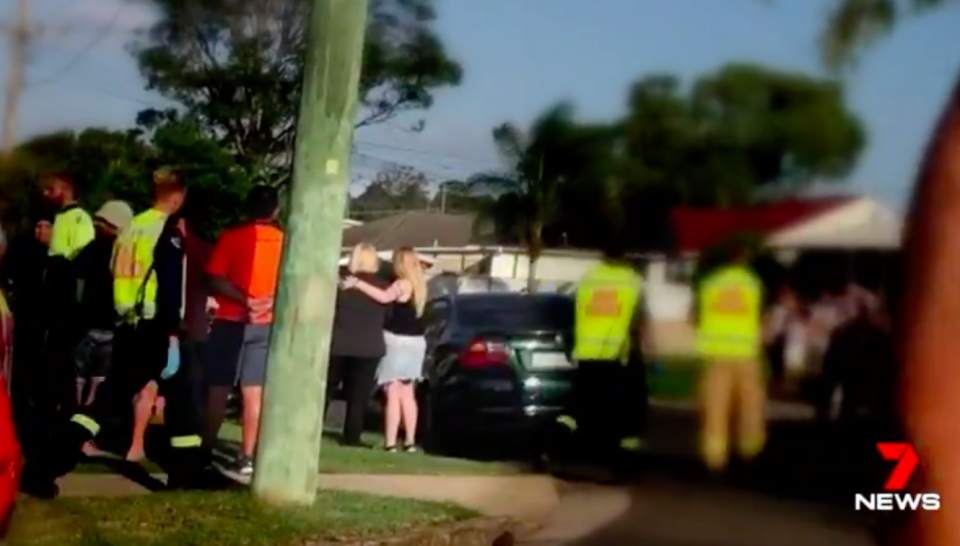 People gather following the accident. Source: 7News