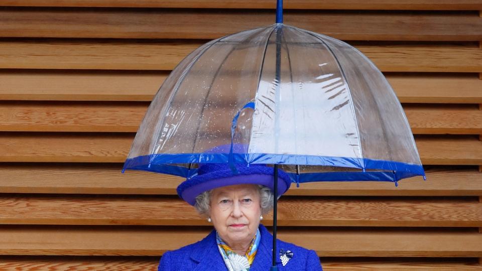 HER MAJESTY ALWAYS CARRIED A BESPOKE UMBRELLA