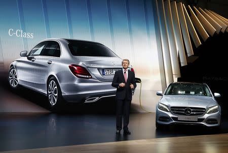 Thomas Weber, the member of Daimler board of management, presents the new Mercedes C 350 e during the first press day ahead of the 85th International Motor Show in Geneva March 3, 2015. REUTERS/Arnd Wiegmann