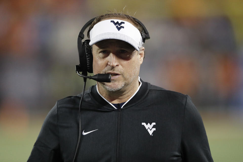 Dana Holgorsen has left a school in the Big 12 for a team that wants to join the Big 12. (Joe Robbins/Getty Images)
