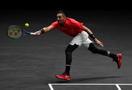 Tennis - Laver Cup - 3rd Day - Prague, Czech Republic - September 24, 2017 - Nick Kyrgios of team World in action against Roger Federer of team Europe. REUTERS/David W Cerny