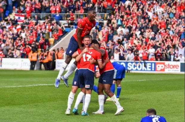 York Press: York City players celebrate Maziar Kouhyar's goal. Picture: Tom Poole