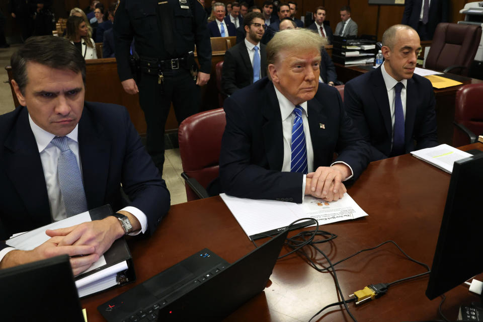 Donald Trump with his attorneys in court on Monday. (Photo by Spencer Platt/Getty Images)