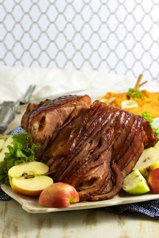 <p>The Suburban Soap Box</p><p>This easy-to-make Bourbon Honey Baked Ham is dripping with flavor, lightly spiced with a burst of bourbon and honey glaze. </p><p><strong>Get the recipe: <a href="http://thesuburbansoapbox.com/2016/11/30/bourbon-honey-baked-ham/" rel="nofollow noopener" target="_blank" data-ylk="slk:Bourbon Honey Baked Ham;elm:context_link;itc:0;sec:content-canvas" class="link ">Bourbon Honey Baked Ham</a></strong></p>