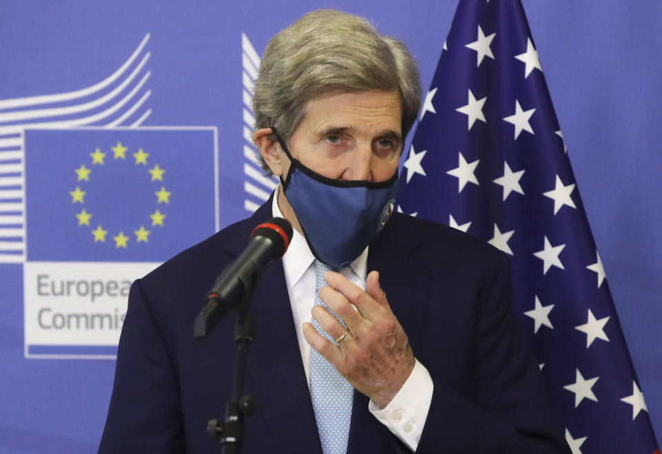 United States Special Presidential Envoy for Climate John Kerry speaks with the media prior to a meeting at EU headquarters in Brussels, Tuesday, March 9, 2021. US special envoy for climate John Kerry traveled to Brussels Tuesday to discuss trans-Atlantic cooperation with European officials in the wake of President Joe Biden's decision to rejoin the global effort to curb climate change. (Olivier Hoslet, Pool via AP)