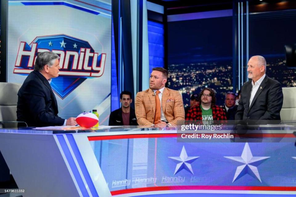 NEW YORK, NEW YORK - MARCH 15: Conor McGregor (C) and Frank Siller visit “Hannity” with host Sean Hannity at Fox News Channel Studios on March 15, 2023 in New York City. (Photo by Roy Rochlin/Getty Images)