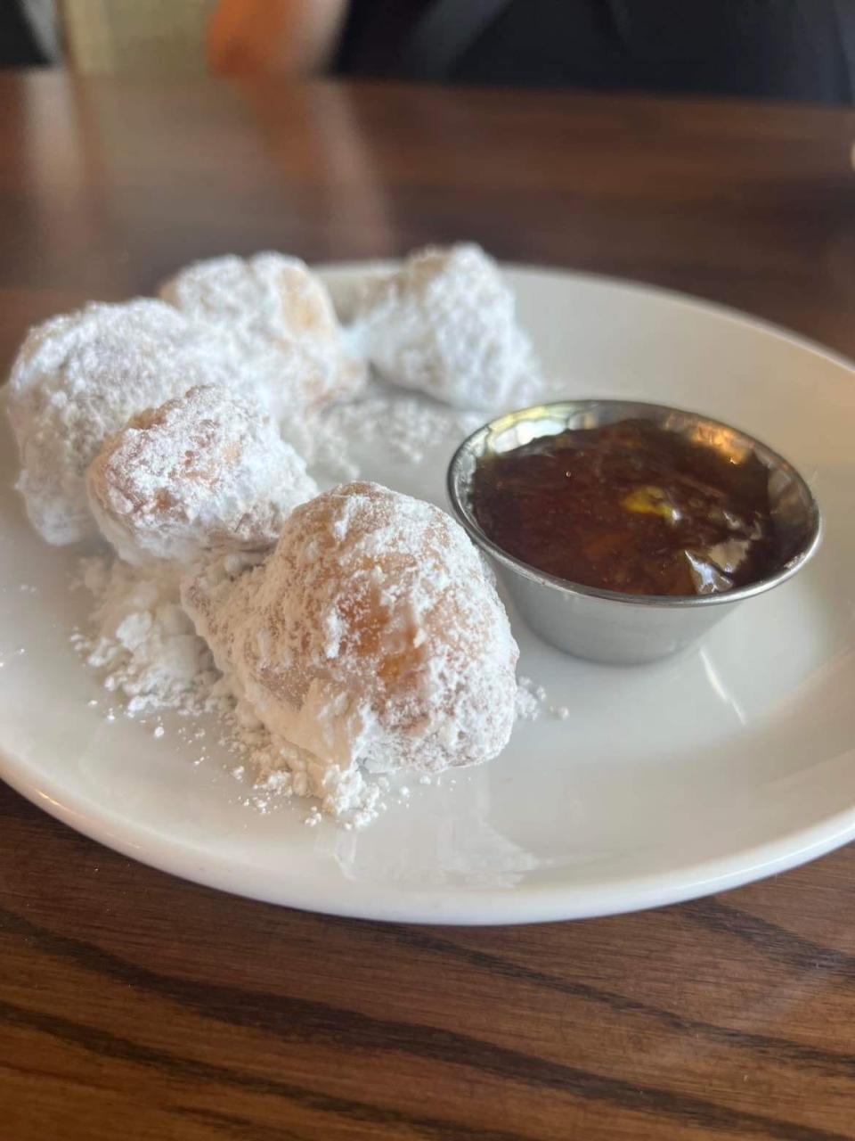 Have a little room for something sweet? Try the light beignets in half order (four) or full order and a honey marmalade.