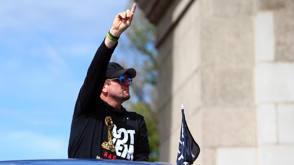 TORONTO, ON - JUNE 17:  Toronto Raptors head coach Nick Nurse waves to the crowd during the Toronto Raptors Victory Parade on June 17, 2019 in Toronto, Canada. The Toronto Raptors beat the Golden State Warriors 4-2 to win the 2019 NBA Finals.  NOTE TO USER: User expressly acknowledges and agrees that, by downloading and or using this photograph, User is consenting to the terms and conditions of the Getty Images License Agreement.  (Photo by Vaughn Ridley/Getty Images)
