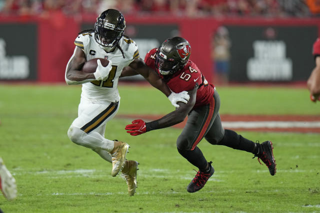 Saints Marshon Lattimore tackles Bucs Mike Evans before the ball is ev, saints