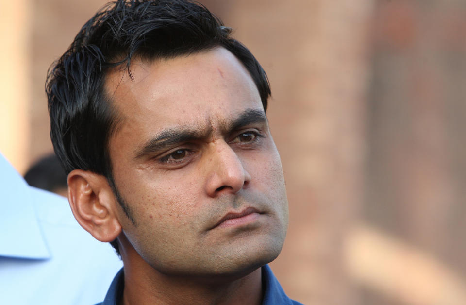 Pakistan's cricket player Mohammad Hafeez listens to reporters during a news conference in Lahore, Pakistan, Thursday, April 3, 2014. Hafeez quit as captain of Pakistan's Twenty20 team on Thursday after it failed to qualify for the semifinals of the World Twenty20 in Bangladesh. (AP Photo/K.M. Chaudary)