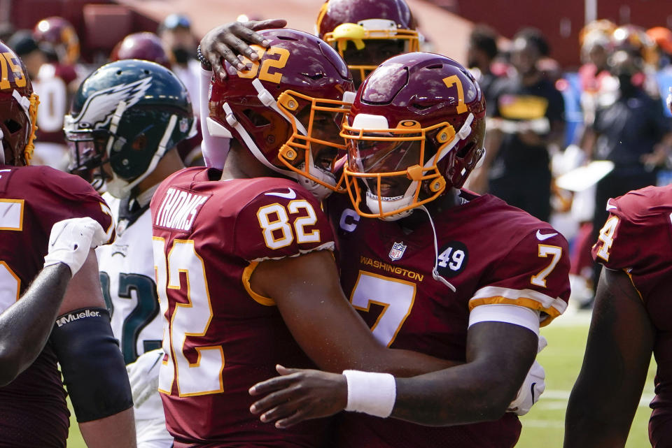 Washington Football Team tight end Logan Thomas (82) celebrates his touchdown against Philadelphia Eagles with teammate quarterback Dwayne Haskins (7), during the first half of an NFL football game, Sunday, Sept. 13, 2020, in Landover, Md. (AP Photo/Susan Walsh)