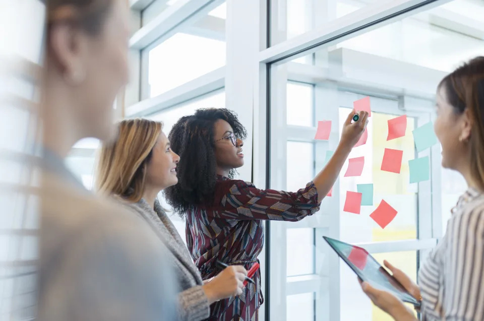 Businesswoman using digital tablet in meeting