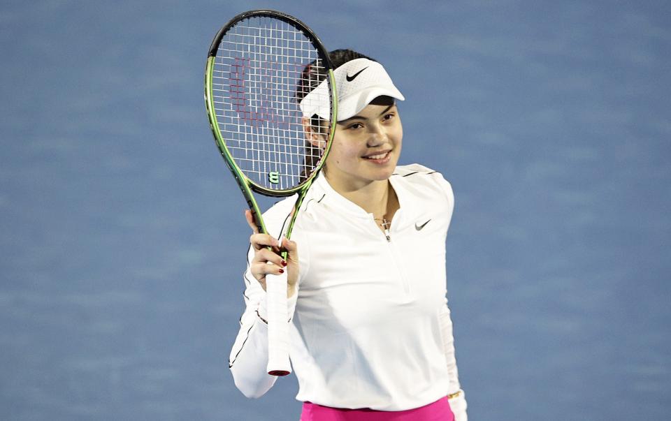 Emma Raducanu waves to the crowd after her first-round win in Auckland