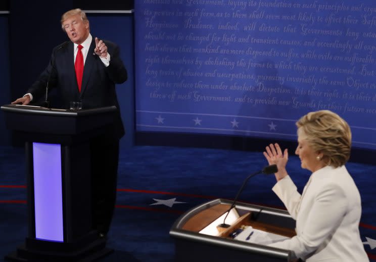 Donald Trump speaks as Hillary Clinton listens during their third and final 2016 presidential campaign debate. (Photo: Mark Ralston/Pool/Reuters)