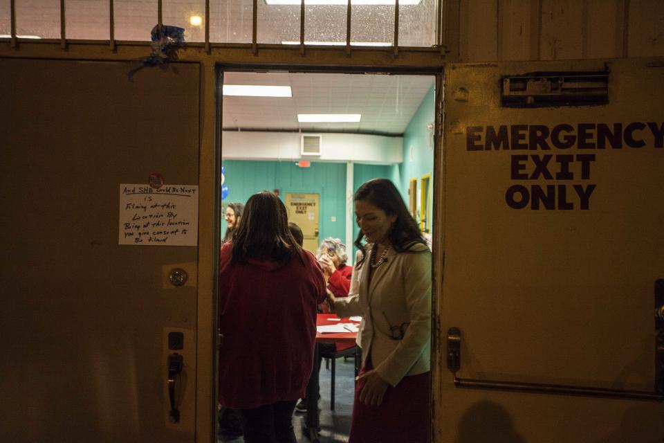 New Mexico congressional candidate Deb Haaland exits the Albuquerque Indian Center after the Native Vote Celebration in Albuquerque, New Mexico midterms election night Tuesday, Nov. 6, 2018. (AP Photo/Juan Labreche)