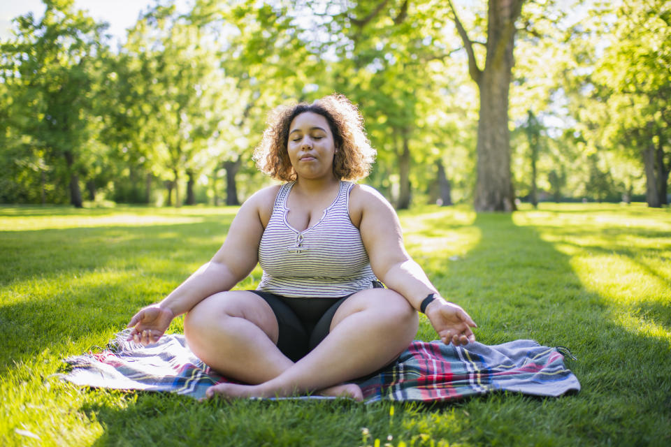 woman doing mindfulness in nature