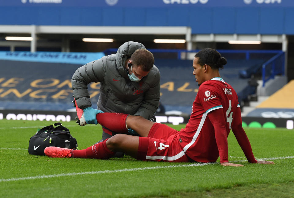 Liverpool's Virgil van Dijk was injured on a tackle by Everton goalkeeper Jordan Pickford during Saturday's Merseyside derby. (John Powell/Getty Images)