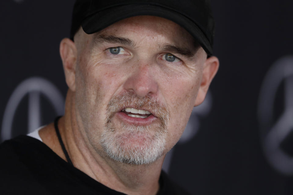 Atlanta Falcons head coach Dan Quinn speaks to reporters after their NFL training camp football practice Monday, July 22, 2019, in Flowery Branch, Ga.(AP Photo/John Bazemore)