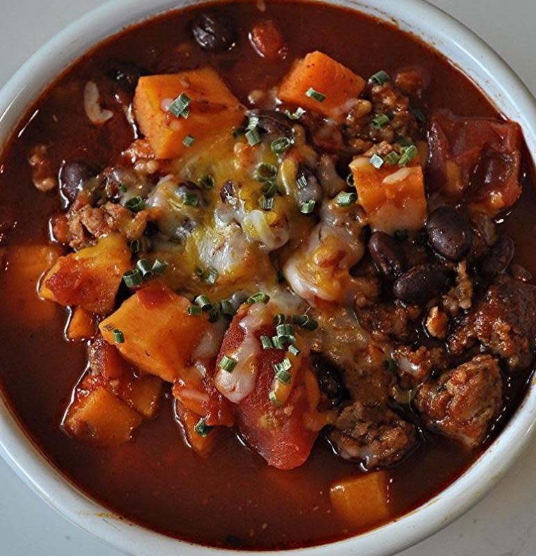<p>Everyday Mom's Meals</p><p>A sweet and spicy fall time spin on classic chili. </p><p><strong>Get the recipe: <a href="https://everydaymomsmeals.blogspot.com/2014/09/a-new-kind-of-chili.html" rel="nofollow noopener" target="_blank" data-ylk="slk:Slow Cooker Sausage and Sweet Potato Chili;elm:context_link;itc:0;sec:content-canvas" class="link rapid-noclick-resp">Slow Cooker Sausage and Sweet Potato Chili</a></strong></p>