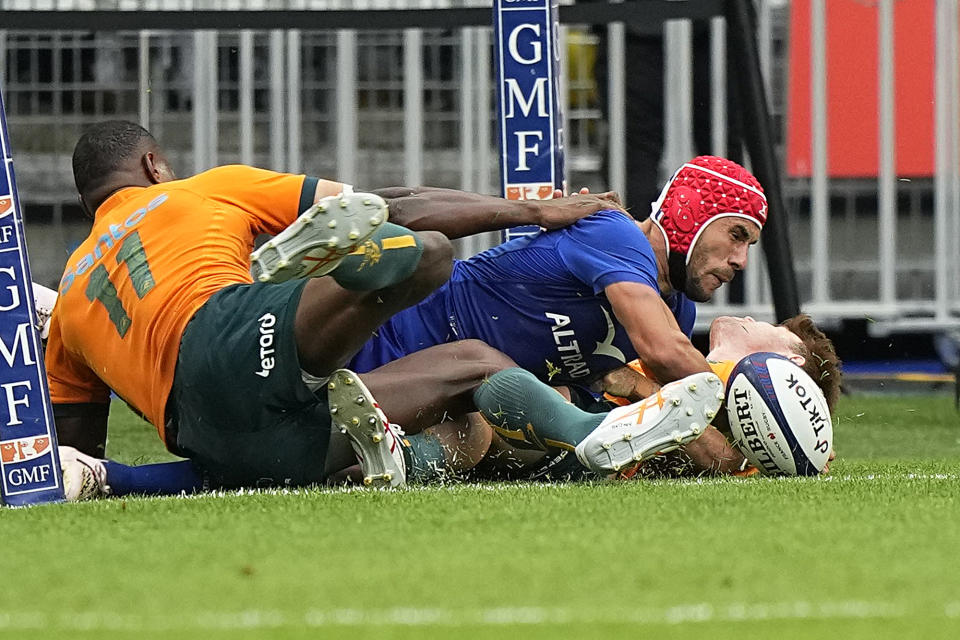 France's Uini Atonio scores a try during the International Rugby Union World Cup warm-up match between France and Australia at the Stade de France stadium in Saint Denis, outside Paris, Sunday, Aug. 27, 2023. (AP Photo/Michel Euler)