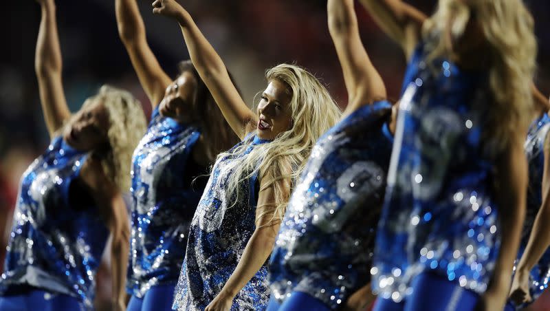 Members of the Cougarettes perform during a timeout as BYU and Utah play an NCAA football game at LaVell Edwards Stadium in Provo on Saturday, Sept. 11, 2021.