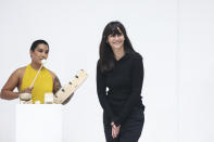 Designer Marie-Christine Statz accepts applause after the Gauchere Spring-Summer 2021 fashion collection, Wednesday, Sept. 30, 2020, during Paris fashion week. (Photo by Vianney Le Caer/Invision/AP)