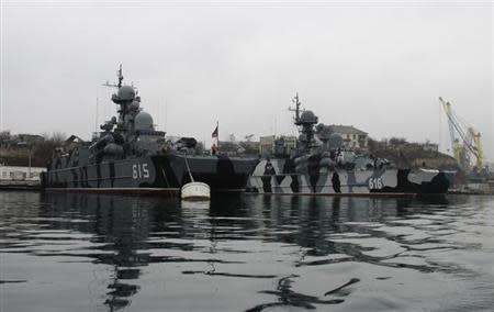 Russian military vessels are anchored at a navy base in the Ukrainian Black Sea port of Sevastopol, Crimea, February 27, 2014. REUTERS/Stringer