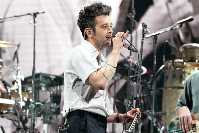 <p>Jeff Kravitz/Getty</p> Matty Healy of The 1975 performs onstage at the 2024 iHeartRadio ALTer EGO in January 2024 in Anaheim
