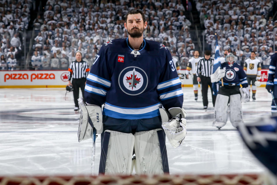 Connor Hellebuyck signed a huge extension on the eve of the 2023-24 NHL season. (Photo by Jonathan Kozub/NHLI via Getty Images)