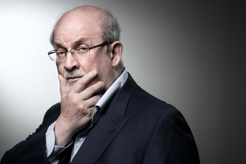 British novelist and essayist Salman Rushdie poses during a photo session in Paris. - Salman Rushdie, who spent years in hiding after an Iranian fatwa ordered his killing, was on a ventilator and could lose an eye following a stabbing attack at a literary event in New York state.