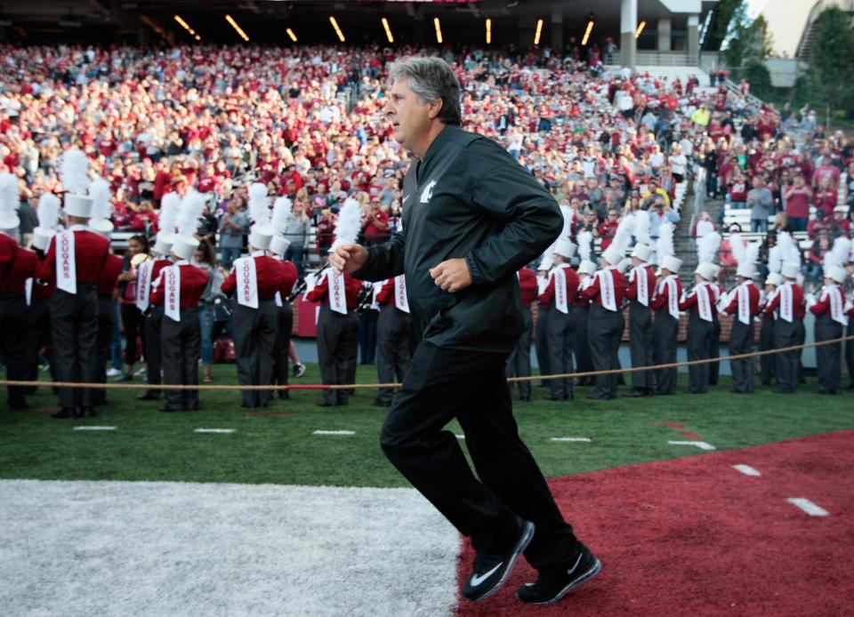 Mike Leach is definitely not dancing in this photo. Nope. (Getty)