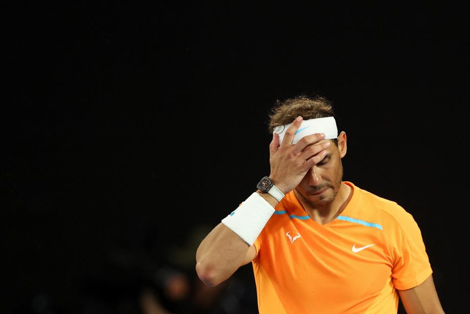 Spain's Rafael Nadal looks dejected after losing his second round match (REUTERS)