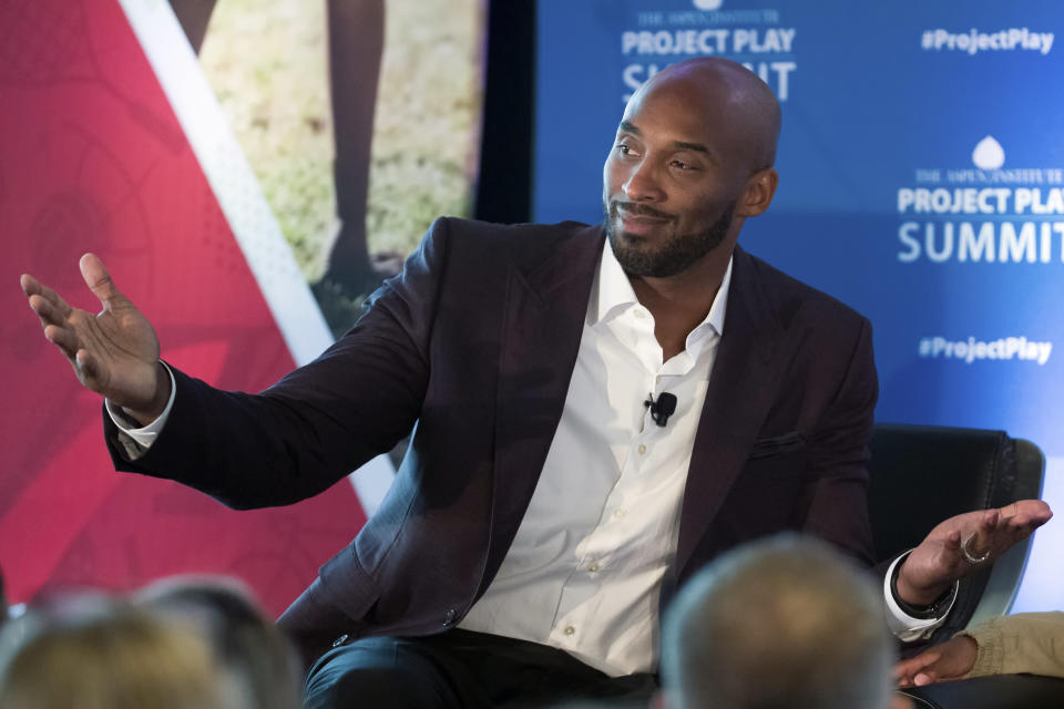 Former NBA basketball all-star Kobe Bryant gestures as he moderates a panel about youth sports during the Aspen Institute's Project Play Summit, Tuesday, Oct. 16, 2018 in Washington. (AP Photo/Alex Brandon)