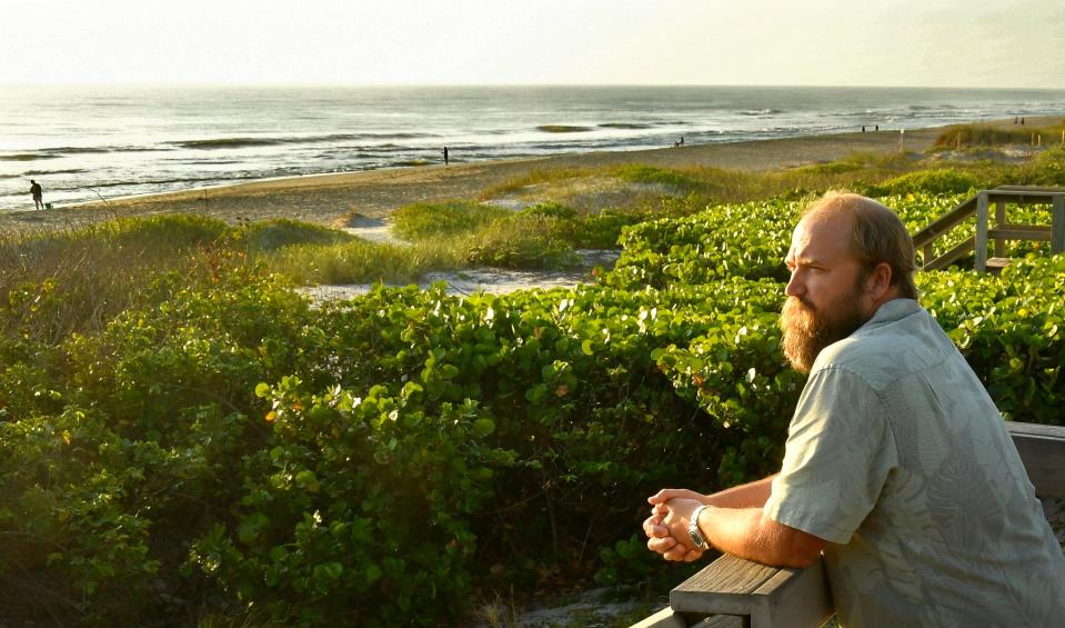  On Melbourne Beach in the morning. Travis Hunsucker, Ph.D.,Assistant Professor of Ocean Engineering at Florida Institute of Technology.