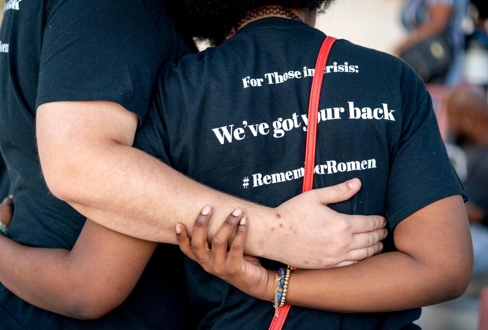 Abeni Matthews, left, and Skylar Meany remember their friend Romen Phelps during a press conference outside the West Palm Beach Police Department on May 13, 2023.