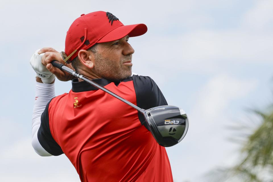 Sergio Garcia of the Fireballs plays his shot from the eighth tee during the final round of LIV Golf Miami golf tournament at Trump National Doral.