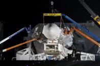 A SpaceX Falcon 9 rocket is prepared for another launch attempt for a supply mission to the International Space Station from historic launch pad 39A at the Kennedy Space Center in Cape Canaveral, Florida, U.S., February 18, 2017. Launch is scheduled for February 19. REUTERS/Joe Skipper