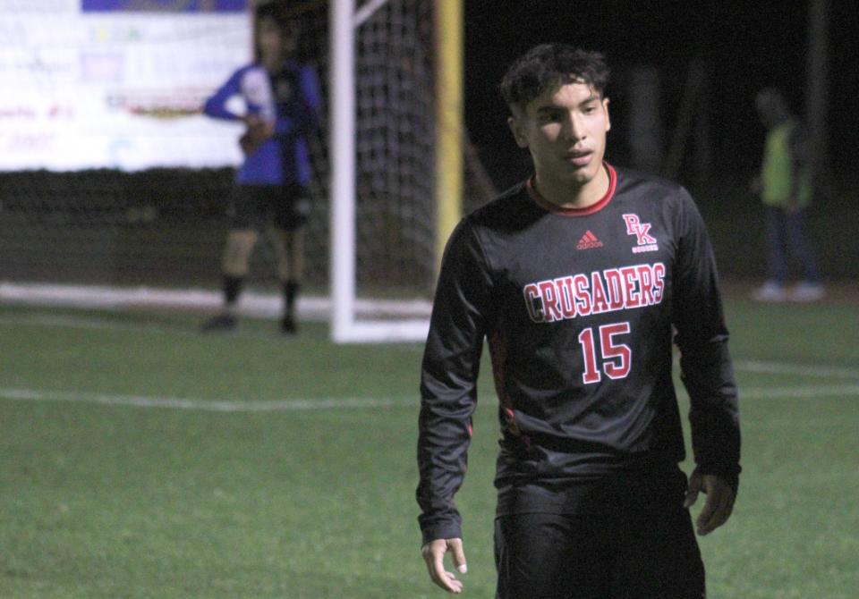 Bishop Kenny midfielder Andy Ledesma (15) prepares to receive the ball for a defensive free kick against Beachside during  an FHSAA Region 1-4A boys soccer semifinal on February 13, 2023. [Clayton Freeman/Florida Times-Union]