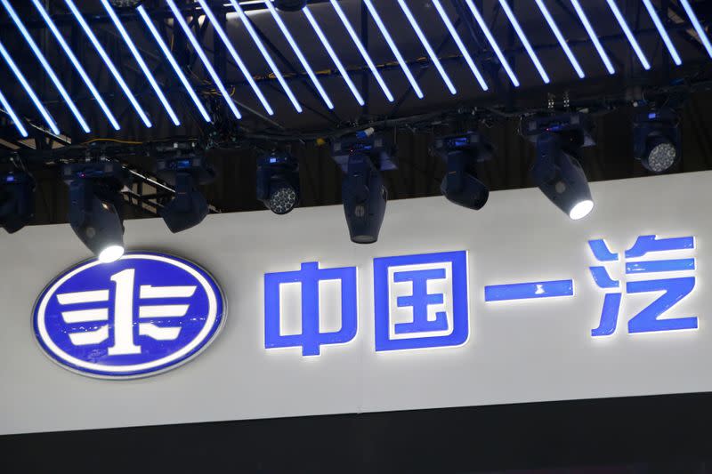 FILE PHOTO: The logo of China FAW Group Corp is displayed at the Auto China 2016 auto show in Beijing