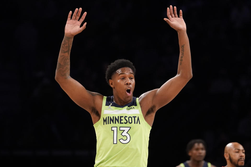 Minnesota Timberwolves forward Nathan Knight reacts after a foul was called on him during the first half of the team's NBA basketball game against the Brooklyn Nets, Friday, Dec. 3, 2021, in New York. (AP Photo/Mary Altaffer)