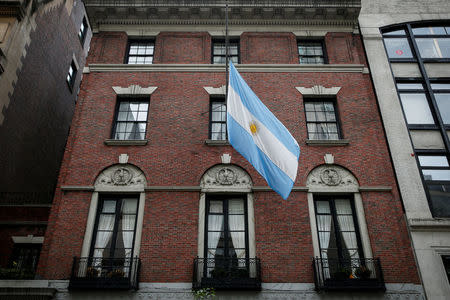 The flag hangs at half mast at the Argentine Consulate, in honour of the five Argentine citizens who were killed in the truck attack in New York on October 31, in New York City, U.S., November 2, 2017. REUTERS/Brendan McDermid
