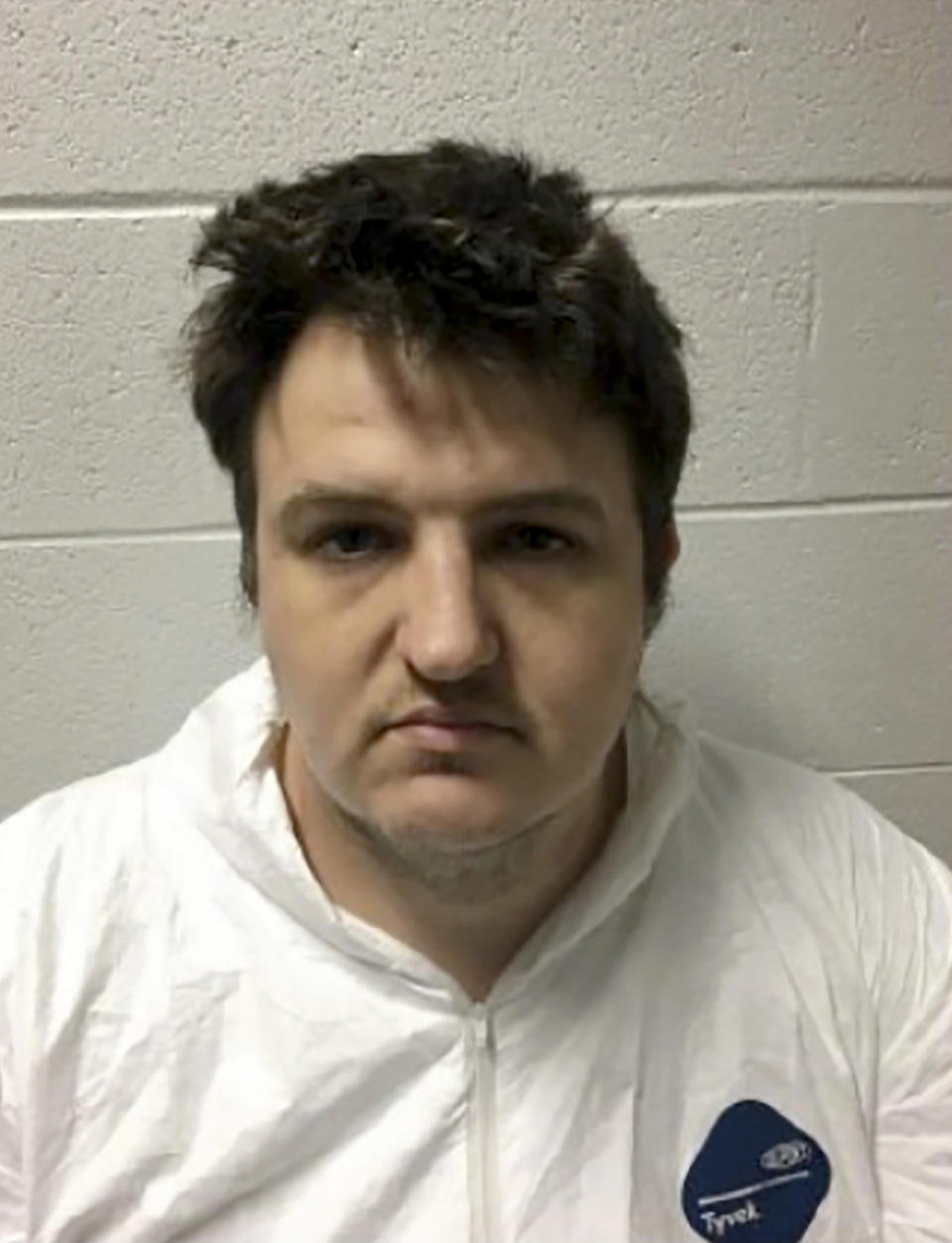 This booking photo provided by the Office of the States Attorney of Lake County, Illinois, shows Jason Karels on Monday, June 13, 2022. Karels faces three counts of first-degree murder in the drowning deaths Monday of his three young children. (Office of the States Attorney of Lake County, Illinois via AP)