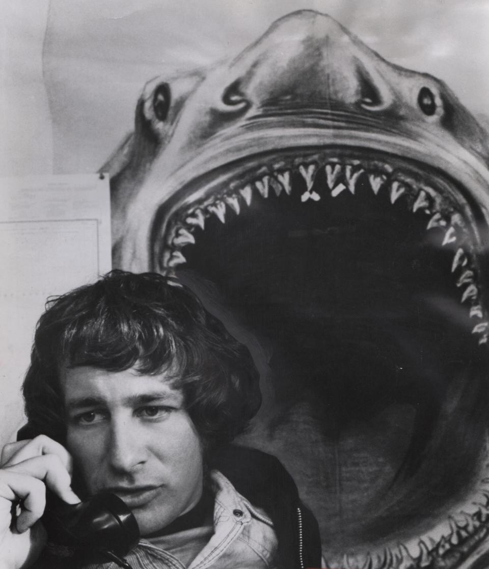 Director Steven Spielberg is on the phone while filming "Jaws" in 1974. Spielberg was born in Cincinnati.